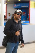 Mika Singh snapped at the airport on 12th July 2015